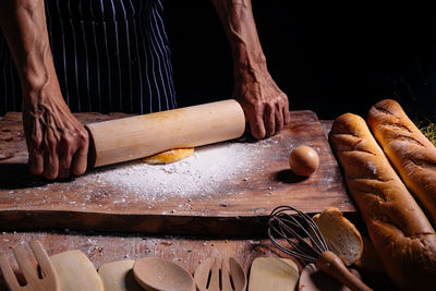 Midsection of person preparing food