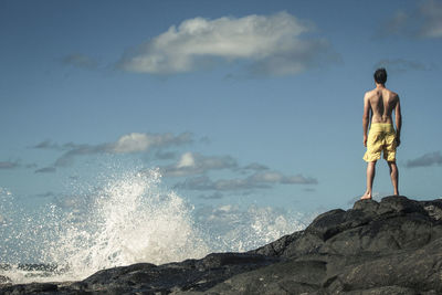 Silhouette of woman against sky
