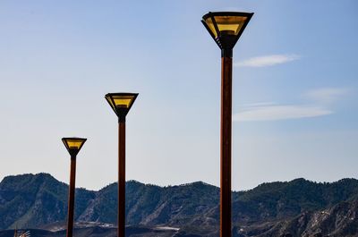 Street light against sky