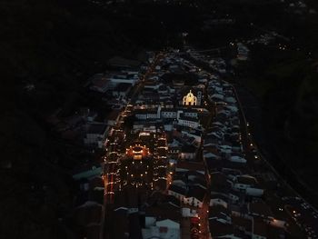 High angle view of illuminated buildings at night