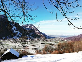 Scenic view of snowcapped mountains against sky