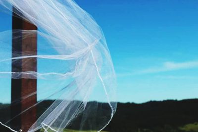 Close-up of water against blue sky