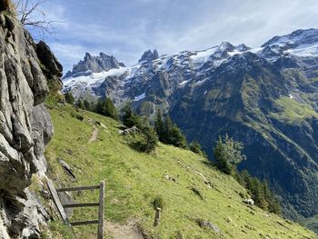 Scenic view of snowcapped mountains against sky