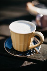 Close-up of cappuccino on table