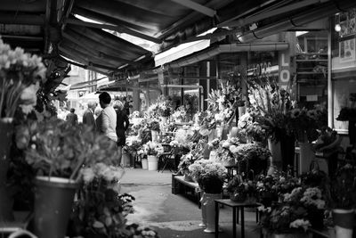 People at market stall