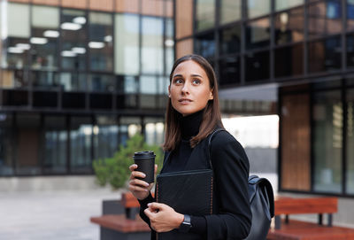 Young woman using mobile phone