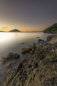 Scenic view of sea against sky during sunset