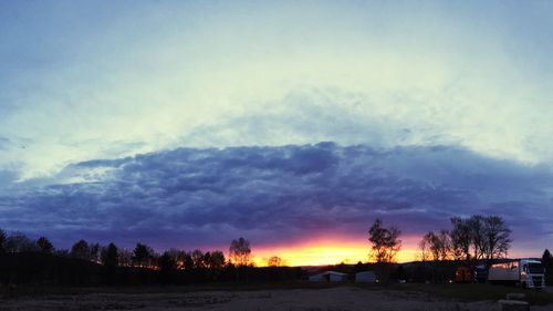 Scenic view of dramatic sky during sunset