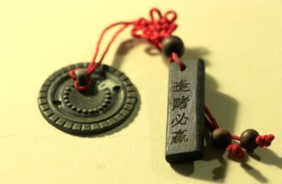 Close-up of religious offering on table