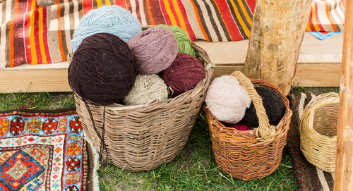 High angle view of multi colored wicker basket for sale at market stall