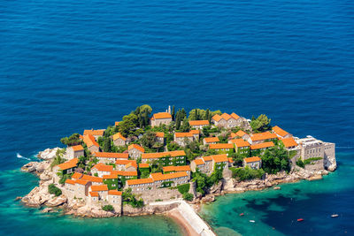 High angle view of town by sea