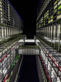 Illuminated modern building in city at night