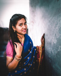 Portrait of smiling young woman