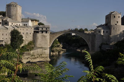 Arch bridge over river