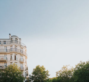 Low angle view of buildings against clear sky