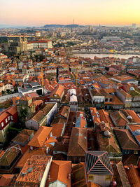 Porto panoramic view. red tile rooftops, river douro, portugal. sunset golden hour