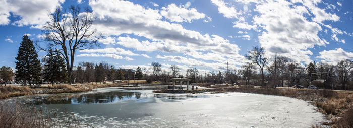 Scenic view of snow covered landscape against sky