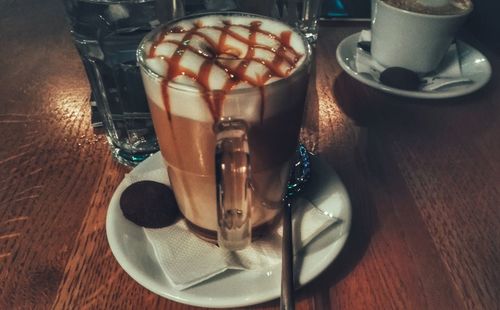 Close-up of coffee served on table