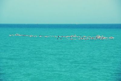 Scenic view of sea against blue sky