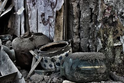 Close-up of abandoned old rusty wheel