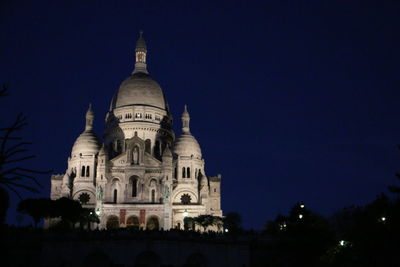 Low angle view of church against sky at night