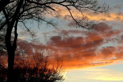 Low angle view of cloudy sky at sunset