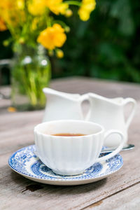 Close-up of tea cup on table