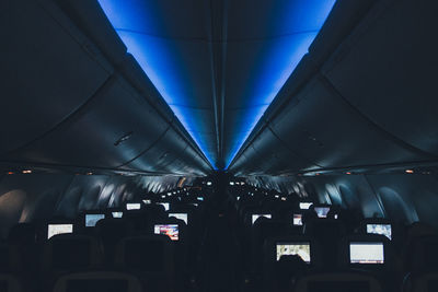 Illuminated device screens in airplane