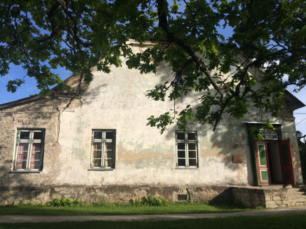 EXTERIOR OF HOUSE AND TREE