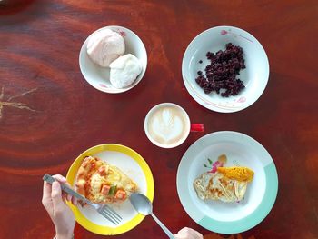 High angle view of breakfast served on table