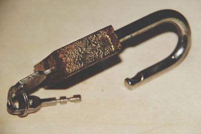 Close-up of rusty metal on table