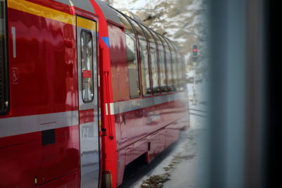 Red train during winter