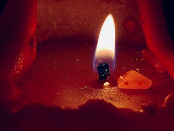 High angle view of lit candles