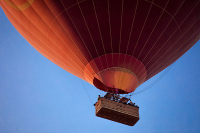 Low angle view of hot air balloon against clear sky