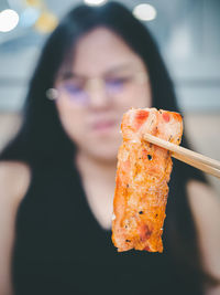 Close-up of woman holding ice cream