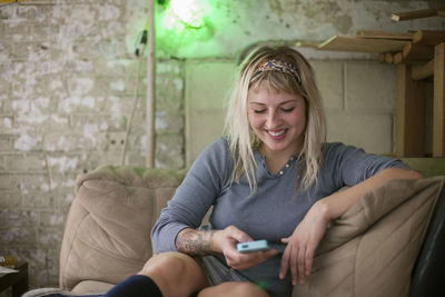 Portrait of a young woman on her cell phone.