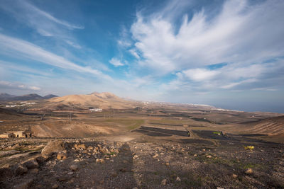 Scenic view of desert against sky