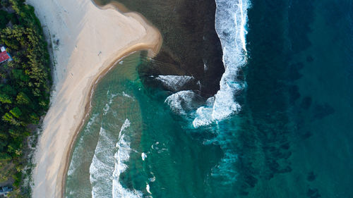 High angle view of sea and beach