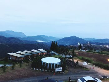 High angle view of houses and buildings against sky