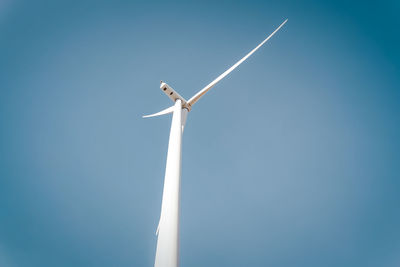 Low angle view of windmill against clear sky