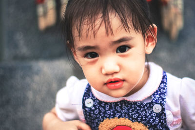 Portrait of cute girl outdoors