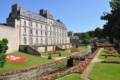 View of garden with buildings in background