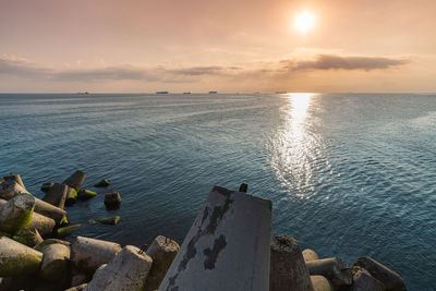 Scenic view of sea against sky during sunset