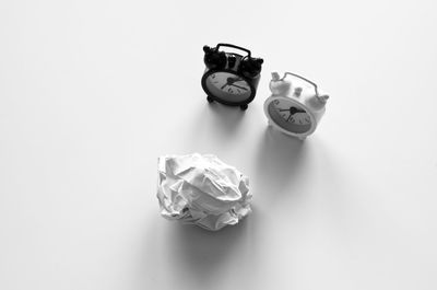 High angle view of toys on table against white background