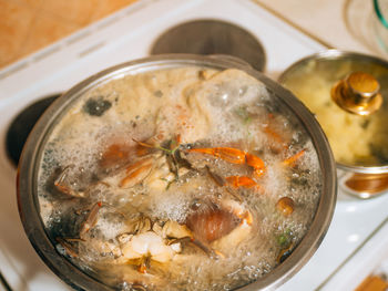 High angle view of soup in glass on table