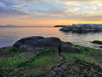 Scenic view of sea against sky during sunset