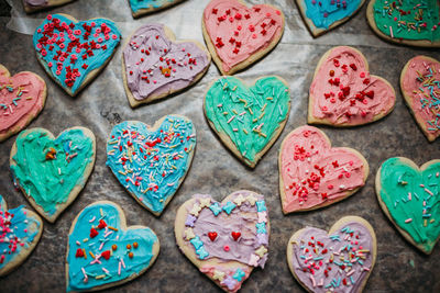 Colorful heart shaped valentines cookies with sprinkles