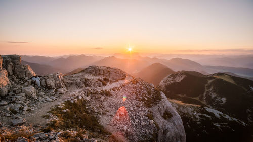 Scenic view of mountains against sky during sunset