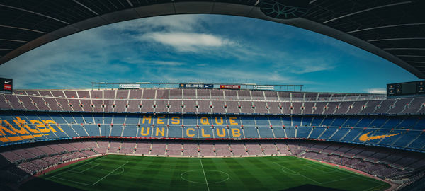 Low angle view of soccer field against sky