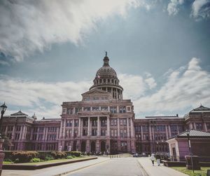 View of historic building against cloudy sky